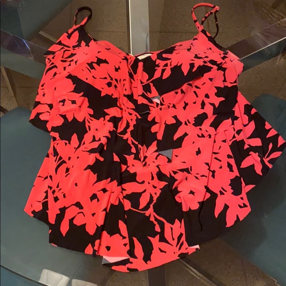 Tankini two piece bathing suit.